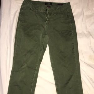 Army green skinny jeans.  70% Cotton true to size